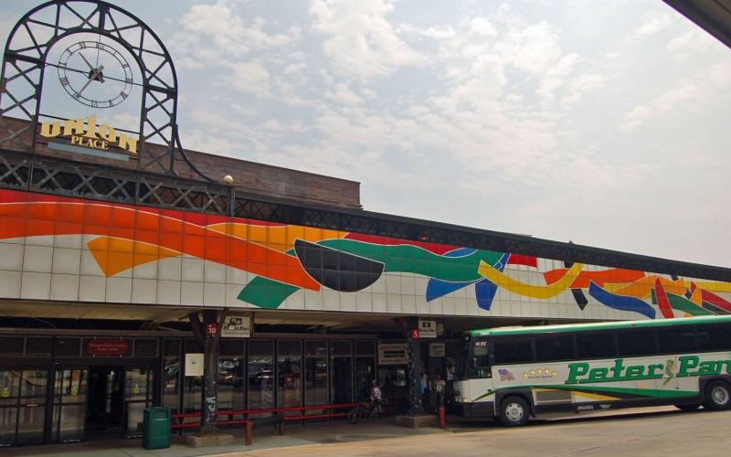 a bus parked outside of a building